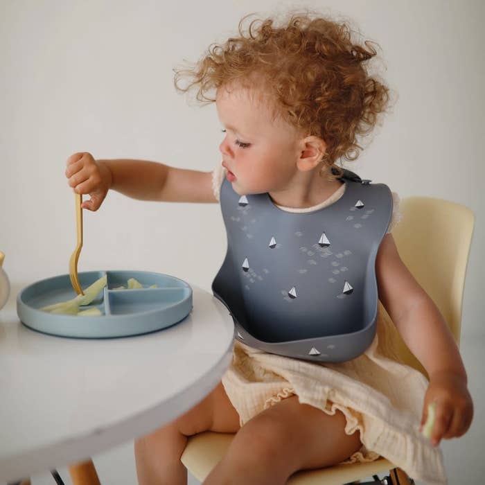 Mushie - Silicone Baby Bib Lifestyle